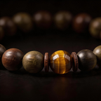 Houtu Bracelet – Aged Jinnanmu Wood with Natural Golden Brown Tiger's Eye Bead